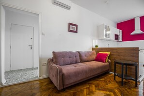 Apartamento luxo | Área de estar | TV de tela plana