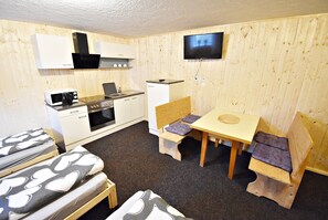 Quadruple Room, Shared Bathroom (6) | Living area | 32-inch flat-screen TV with satellite channels, TV