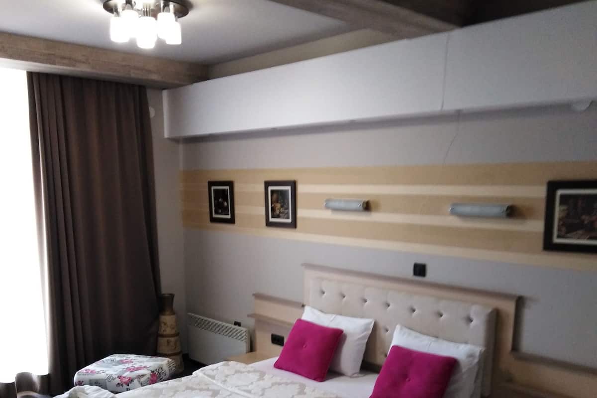 Deluxe-Dreibettzimmer
