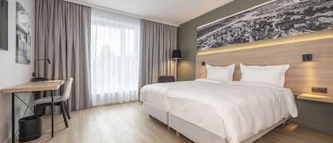 Hypo-allergenic bedding, in-room safe, desk, laptop workspace