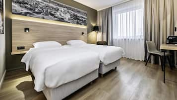 Literie hypoallergénique, coffres-forts dans les chambres, bureau