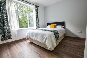 Desk, laptop workspace, free WiFi, bed sheets