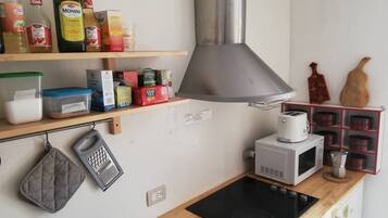 Mini-fridge, microwave, oven, stovetop