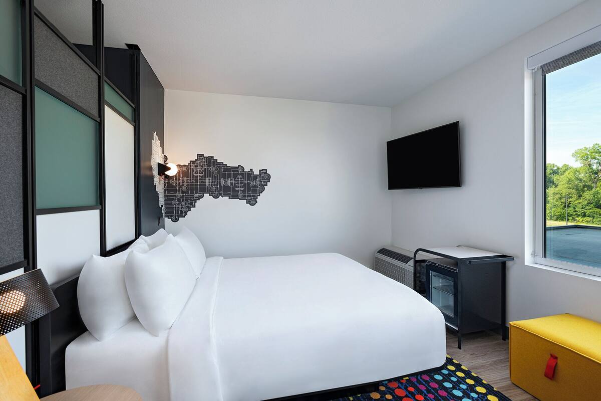 Premium bedding, down comforters, pillowtop beds, in-room safe