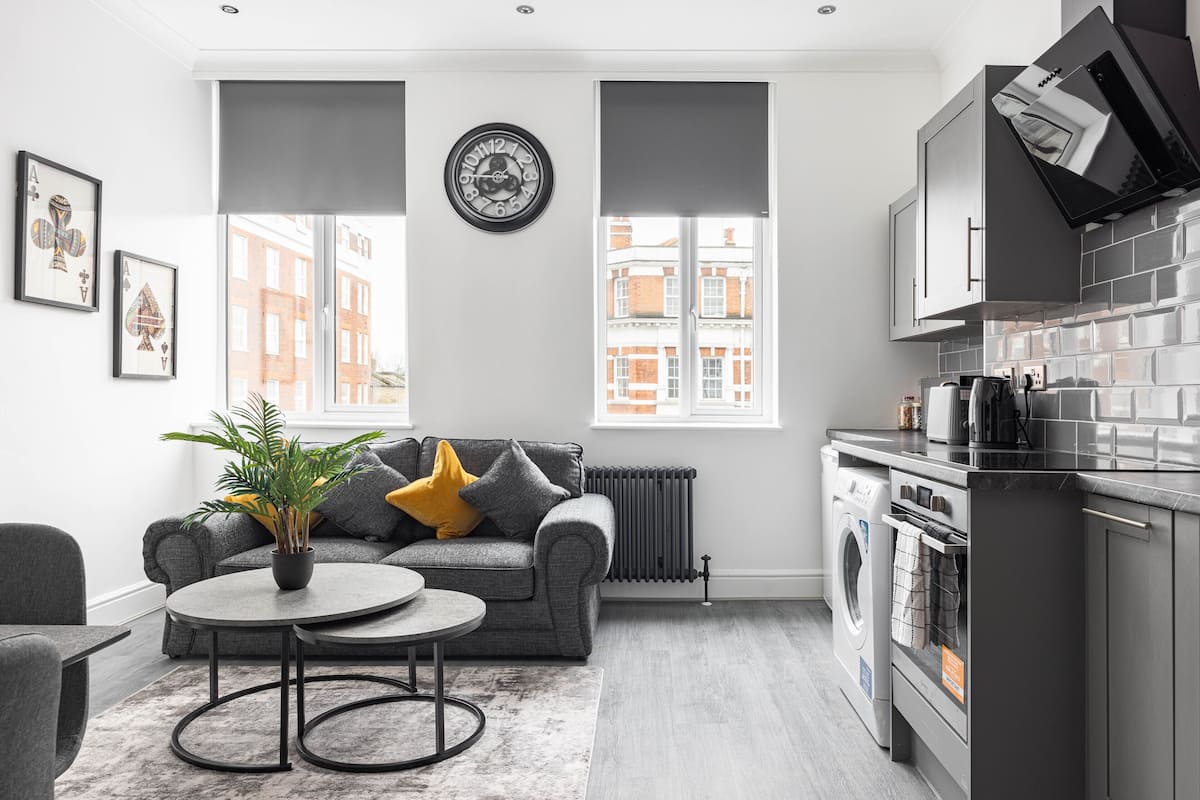 Superior Apartment, 1 Bedroom | Living area | 39-inch flat-screen TV with cable channels, TV
