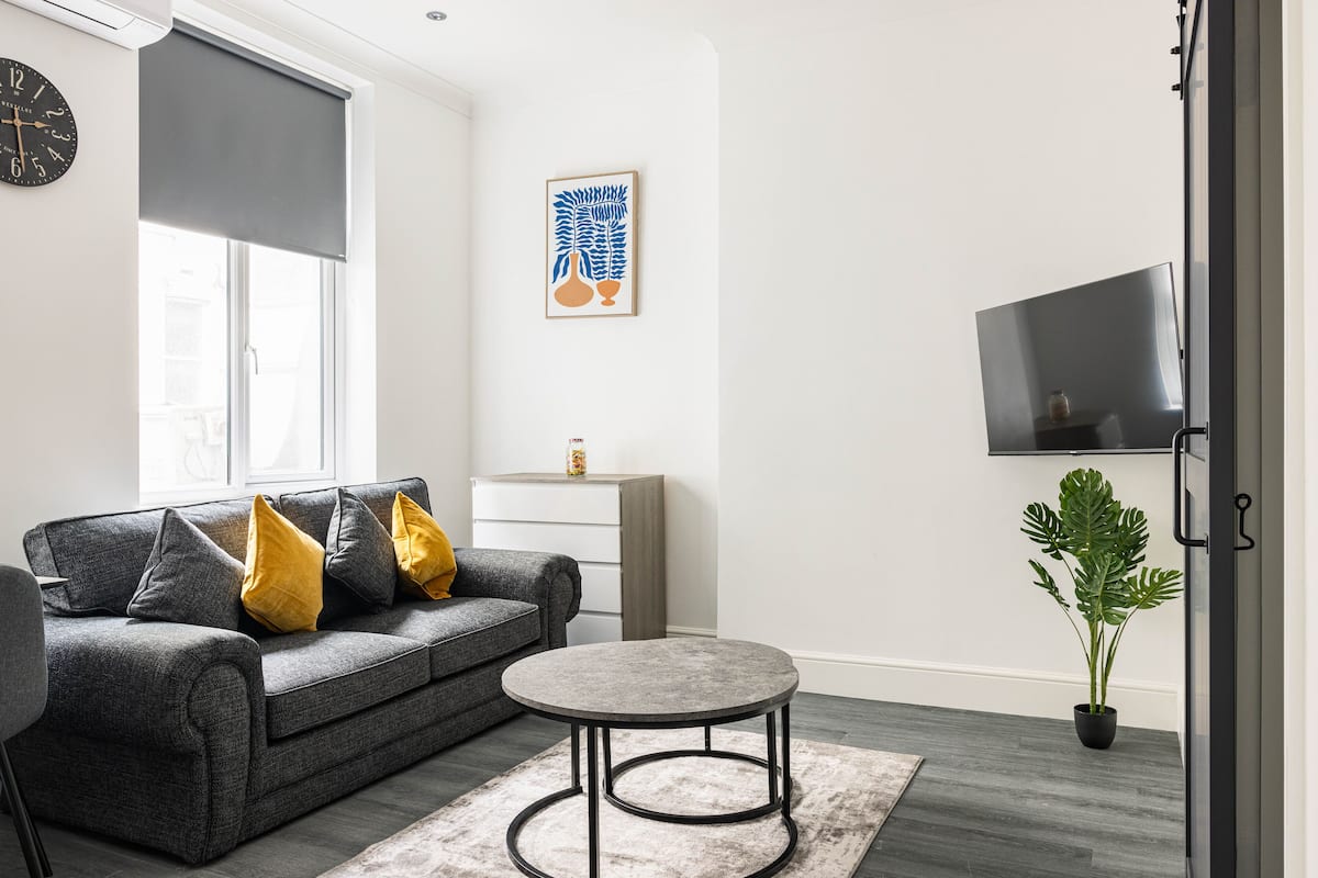 Standard Apartment, 1 Bedroom | Living area | 39-inch flat-screen TV with cable channels, TV