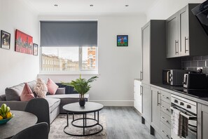 Superior Apartment, 1 Bedroom | Living area | 39-inch flat-screen TV with cable channels, TV - Edgware Road Apartments (London)
