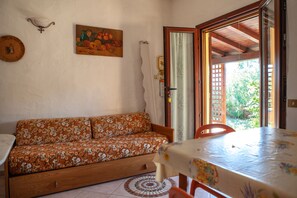 Apartment, 2 Bedrooms | Living area | Flat-screen TV - FANTASTICO SAN TEODORO TAM01 (San Teodoro)