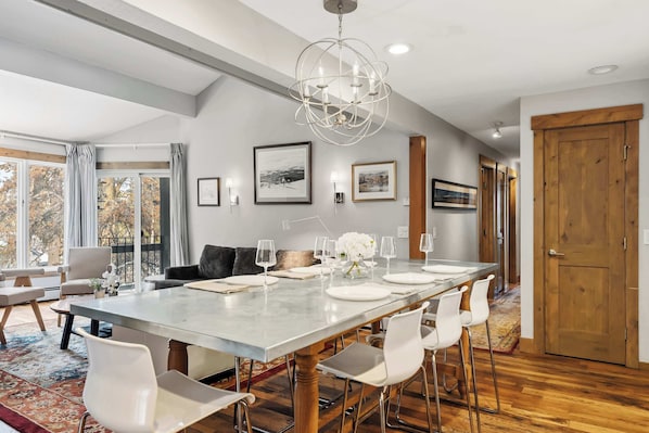 Dining area: Table with 8 seat in open space with kitchen and living room