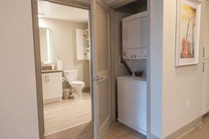 Combined shower/tub, hair dryer, towels, soap