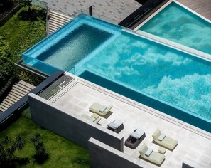 Indoor pool, outdoor pool, open 7:00 AM to 8:00 PM, pool umbrellas