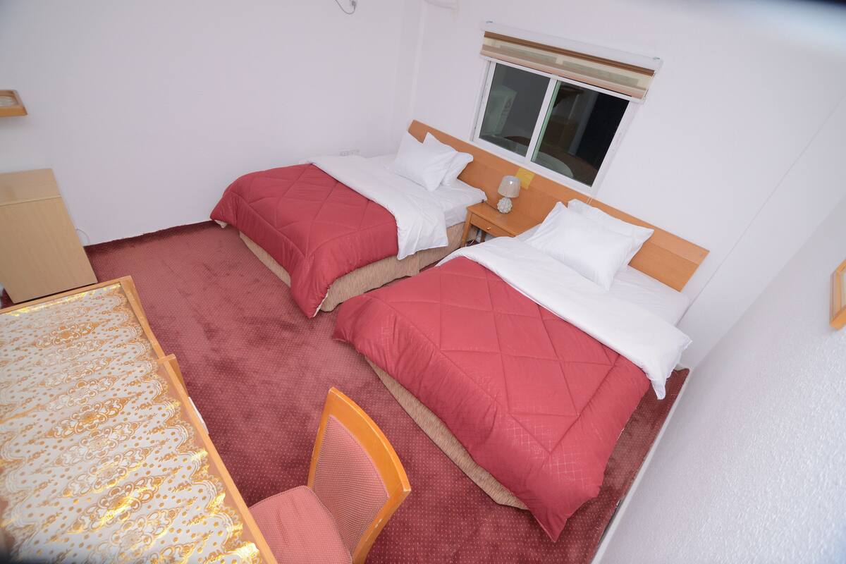 Desk, free WiFi, bed sheets