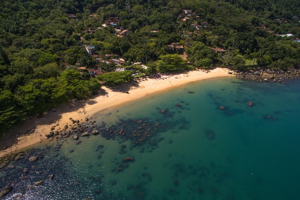 Beach nearby, white sand, beach umbrellas, beach towels
