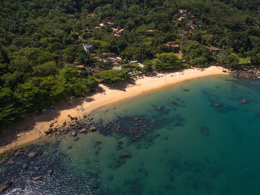 Beach nearby, white sand, beach umbrellas, beach towels