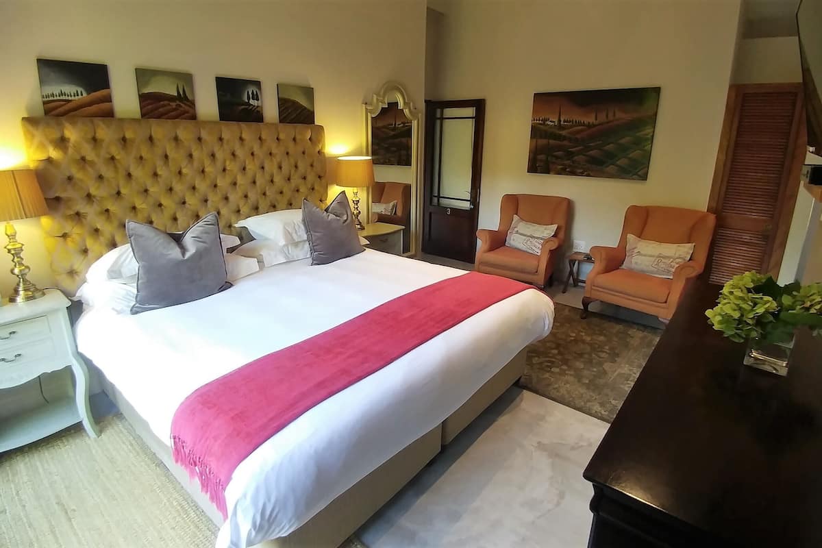 Lyxig studiosvit - 1 sovrum - utsikt mot trÀdgÄrden | SÀngtillbehör av högsta kvalitet och vÀrdeförvaringsskÄp pÄ rummet