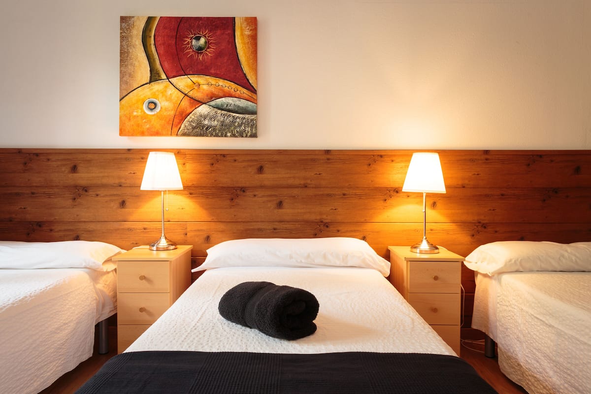 Blackout curtains, iron/ironing board, free WiFi, bed sheets