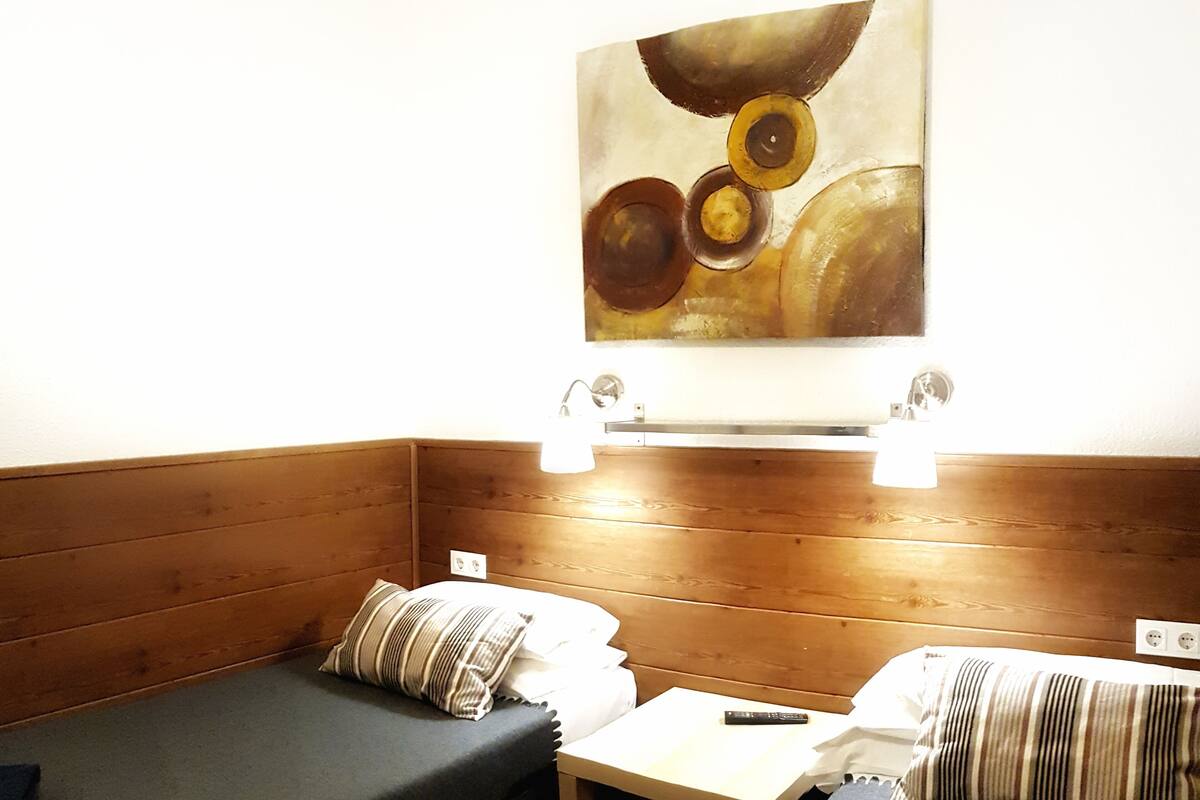 Blackout curtains, iron/ironing board, free WiFi, bed sheets