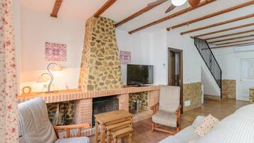 Televisie en een open haard