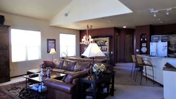 Flat-screen TV, fireplace, DVD player, streaming services