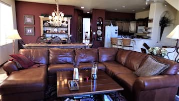 Flat-screen TV, fireplace, DVD player, streaming services