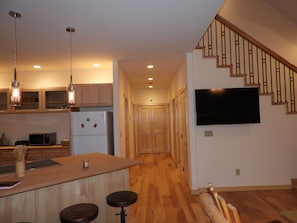 Enjoy cooking in this well-equipped kitchen with a central island and appliances.