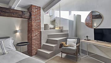 Suite, Non Smoking | 1 bedroom, premium bedding, minibar, in-room safe