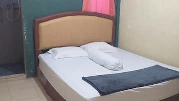 Kamar Standar (AC) | Seprai premium, Wi-Fi gratis, dan seprai linen