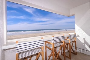 On the beach, sun-loungers, beach towels