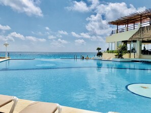 Outdoor pool, pool umbrellas, pool loungers