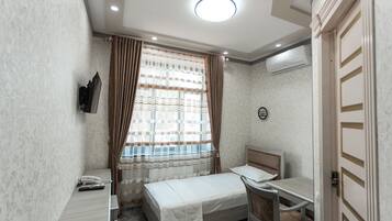 Standard Single Room | 1 bedroom, blackout drapes, iron/ironing board, free WiFi