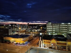 Experience the vibrant city atmosphere with a mix of modern and historic buildings.