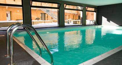 Appartement à 20m du télécabine | Local à Ski + AccÚs Piscine!