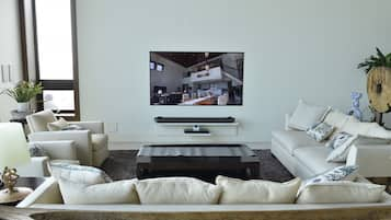 Chartered Villa | Living area | Flat-screen TV