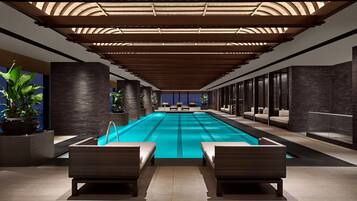 Indoor pool, open 5:00 AM to 11:00 PM, pool loungers