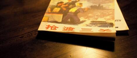 A book with a cover depicting firefighters on a rescue operation.