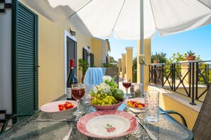 Enjoy a romantic meal for two on this balcony with a view.