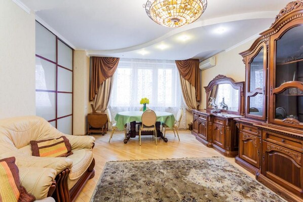 Apartment, 2 Bedrooms | Living area | Flat-screen TV - Cozy apartments on the Left Bank (Kyiv)