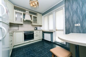 Apartment, 1 Bedroom | Private kitchen | Full-size fridge, microwave, oven, stovetop - Apartment on Cheliabinska 19 (Kyiv)
