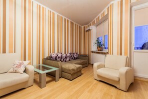 Apartment, 2 Bedrooms | Living area | Flat-screen TV