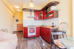 Apartment, 2 Bedrooms | Private kitchen | Electric kettle, cookware/dishes/utensils - Apartments near Druzhby Narodov (Kyiv)