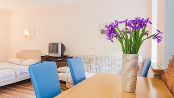 Apartment, 1 Bedroom | Living area | TV