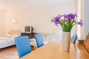Apartment, 1 Bedroom | Living area | TV