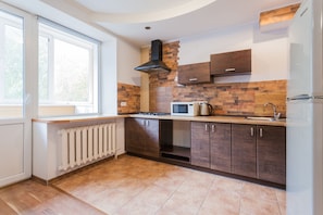 Apartment, 1 Bedroom | Private kitchen | Full-sized fridge, microwave, oven, stovetop