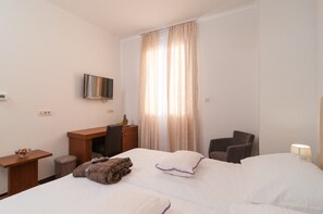 Minibar, bureau, chambres insonorisées, Wi-Fi gratuit