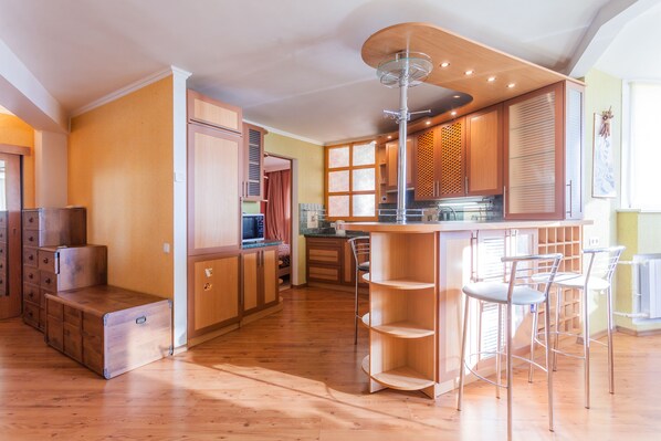 Apartment, 1 Bedroom | Private kitchen | Fridge, microwave, stovetop, cookware/dishes/utensils - Obolon apartment 73 (Kyiv)