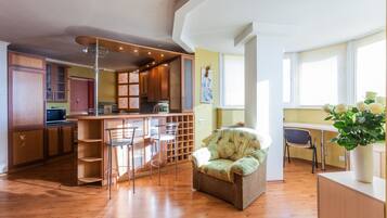 Apartment, 1 Bedroom | Living area | 44-inch LED TV with cable channels, TV