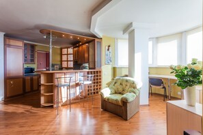 Apartment, 1 Bedroom | Living area | 44-inch LED TV with cable channels, TV - Obolon apartment 73 (Kyiv)