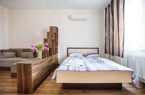 Appartement, 1 slaapkamer | Een strijkplank/strijkijzer