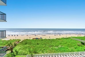 Enjoy breathtaking views of the ocean from this beachfront balcony.