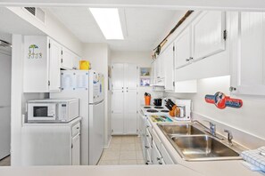 Fridge, microwave, oven, stovetop - Bright Beach Condo, Oceanfront Pool, Picnic Area | Crescent Sands WH - G1 (North Myrtle Beach)